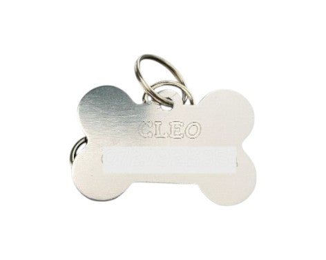 Breloc metalic în formă de os